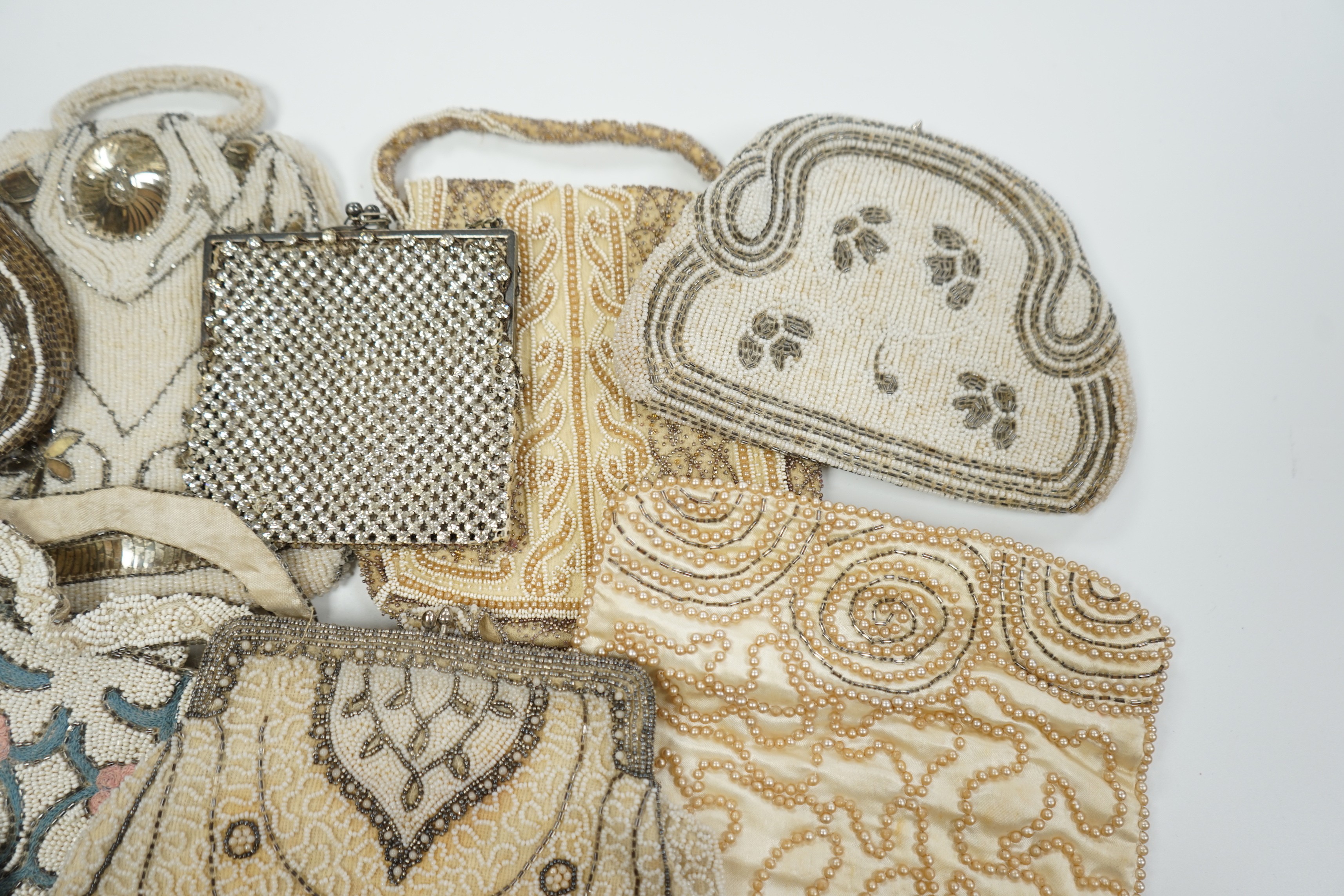 Twelve 1930’s beaded, sequin and pearl evening clutch bags and bags, some with embroidered decoration